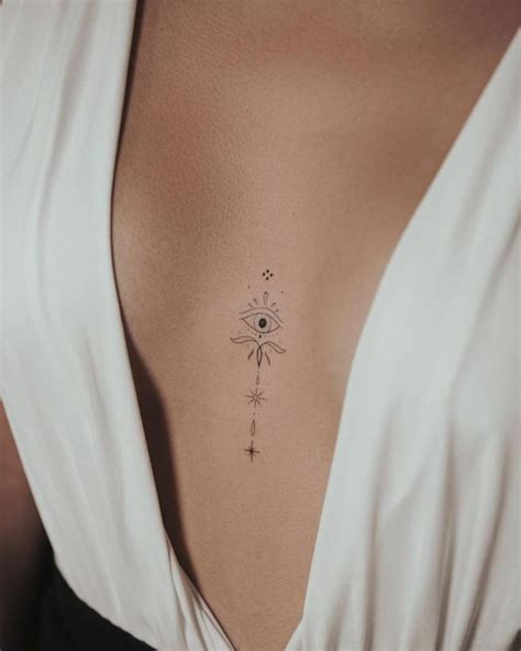 breast tattoo|30 Best Tattoo Between Breast Ideas You Should Check.